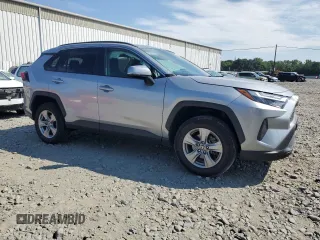 2023 Toyota RAV4 XLE with VIN 2T3P1RFV2PW372352, listed as a Copart auction lot 63701695 with 45,878 mi miles and Salvage title. Bid and sale history available at DreamBid. Image 4.