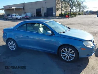 2008 Volkswagen Eos Turbo z VIN WVWBA71F68V026196, wystawiony jako IAAI lot #41238435 z przebiegiem 102 643 mil mil oraz . Historia ofert i sprzedaży dostępna na DreamBid. Obrazek 13.