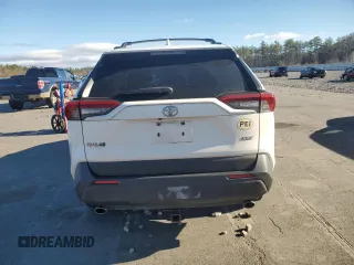 2019 Toyota RAV4 XLE with VIN JTMW1RFV4KD021007, listed as a Copart auction lot 82208754 with 96,998 mi miles and Salvage Title. Bid and sale history available at carsss.com. Image 6.