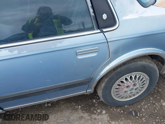 1991 Oldsmobile Cutlass Ciera z VIN 1G3AM54N3M6309525, wystawiony jako IAAI lot #42261904 z przebiegiem 121 774 mil mil oraz . Historia ofert i sprzedaży dostępna na DreamBid. Obrazek 12.