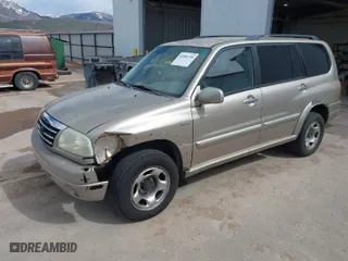 2002 Suzuki XL-7 Standard with VIN JS3TX92V224127965, listed as a IAAI auction lot 42056299 with 176,502 mi miles. Bid and sale history available at carsss.com. Image 2.