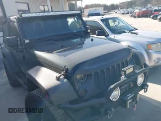 2011 Jeep Wrangler Rubicon with VIN 1J4BA6D10BL628180, listed as a IAAI auction lot 41711065 with 155,940 mi miles. Bid and sale history available at carsss.com. Image 1.