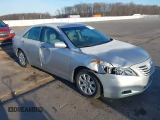 2009 Toyota Camry LE z VIN 4T1BK46K09U084602, wystawiony jako IAAI lot #41847223 z przebiegiem 191 605 mil mil oraz . Historia ofert i sprzedaży dostępna na DreamBid. Obrazek 1.