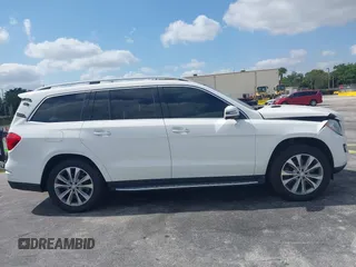 2014 Mercedes-Benz GL-Class GL 450 with VIN 4JGDF7CE0EA298157, listed as a IAAI auction lot 42094478 with 202,424 mi miles. Bid and sale history available at carsss.com. Image 12.