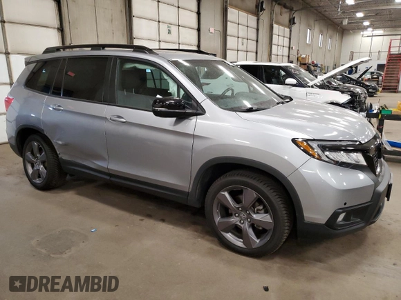 2021 Honda Passport Touring with VIN 5FNYF8H92MB016307, listed as a Copart auction lot 53087325 with 77,126 mi miles and Salvage Title. Bid and sale history available at carsss.com. Image 4.