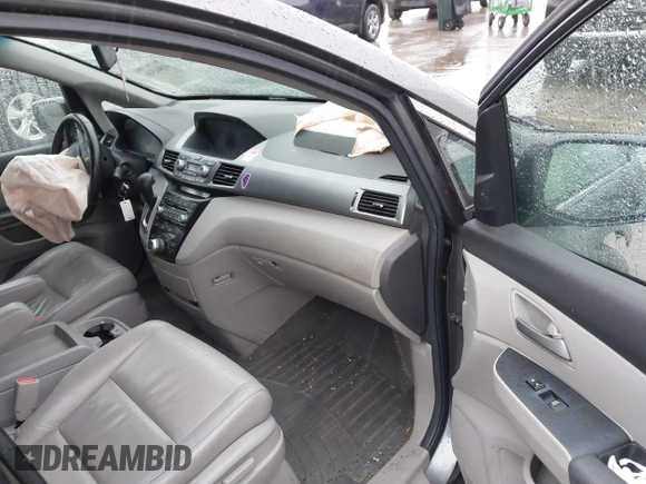 2011 Honda Odyssey Touring Elite with VIN 5FNRL5H9XBB090616, listed as a IAAI auction lot 41944510 with 207,962 mi miles and . Bid and sale history available at DreamBid. Image 5.