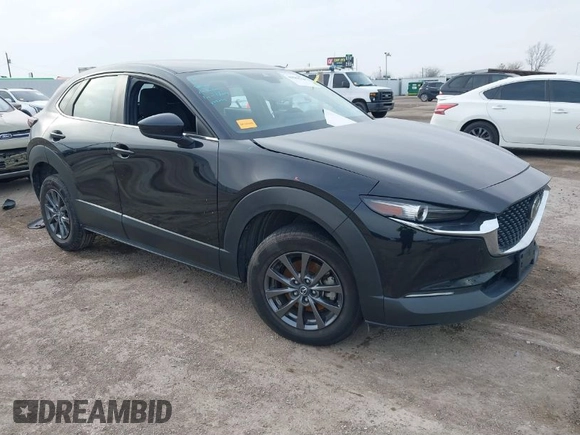 2021 Mazda CX-30 2.5 S with VIN 3MVDMAAL2MM303321, listed as a IAAI auction lot 41583346 with 57,122 mi miles. Bid and sale history available at carsss.com. Image 1.
