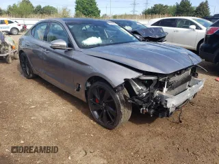 2023 Genesis G70 3.3T with VIN KMTG54TE7PU128609, listed as a Copart auction lot 53644364 with 5,843 mi miles and Salvage title. Bid and sale history available at DreamBid. Image 4.