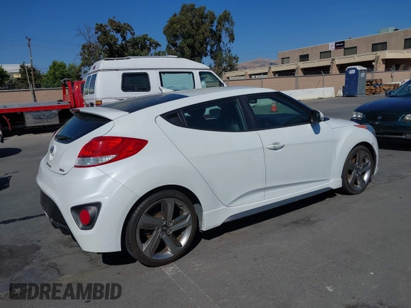 2013 Hyundai Veloster Turbo with VIN KMHTC6AE4DU158224, listed as a IAAI auction lot 42725813 with Not provided miles and . Bid and sale history available at DreamBid. Image 4.