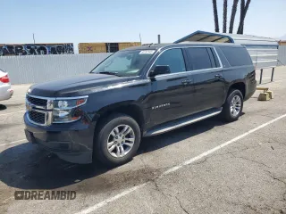 2015 Chevrolet Suburban LT with VIN 1GNSCJKC3FR181667, listed as a Copart auction lot 63282545 with 150,201 mi miles and Salvage title. Bid and sale history available at DreamBid. Image 1.