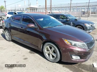 2015 Kia Optima LX z VIN 5XXGM4A77FG485055, wystawiony jako IAAI lot #42149055 z przebiegiem 100 841 mil mil oraz . Historia ofert i sprzedaży dostępna na DreamBid. Obrazek 1.