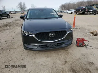 2018 Mazda CX-5 Touring with VIN JM3KFBCM2J0427786, listed as a Copart auction lot 45539345 with 62,989 mi miles and Salvage Title. Bid and sale history available at carsss.com. Image 5.
