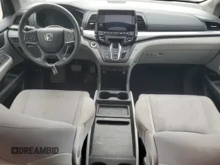 2018 Honda Odyssey with VIN 5FNRL6H49JB504977, listed as a Copart auction lot 60905615 with 180,464 mi miles and Clean title. Bid and sale history available at DreamBid. Image 8.