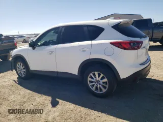 2016 Mazda CX-5 Touring with VIN JM3KE2CY7G0657113, listed as a Copart auction lot 46489835 with 166,399 mi miles and Salvage Title. Bid and sale history available at DreamBid. Image 2.
