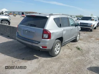 2016 Jeep Compass Latitude with VIN 1C4NJCEA7GD675742, listed as a IAAI auction lot 41877787 with 107,749 mi miles and . Bid and sale history available at DreamBid. Image 4.