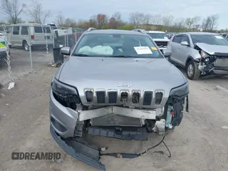 2019 Jeep Cherokee Latitude with VIN 1C4PJLCB6KD159997, listed as a IAAI auction lot 42102904 with 72,064 mi miles and . Bid and sale history available at carsss.com. Image 12.