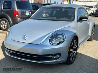 2012 Volkswagen Beetle 2.0T Turbo with VIN 3VW467AT8CM650890, listed as a Copart auction lot 83903324 with 105,476 mi miles and Clean Title. Bid and sale history available at carsss.com. Image 2.