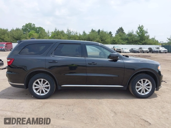 2015 Dodge Durango SXT with VIN 1C4RDJAG3FC161270, listed as a IAAI auction lot 42460444 with 112,633 mi miles and . Bid and sale history available at DreamBid. Image 13.