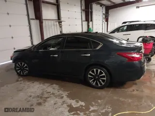 2018 Nissan Altima 2.5 SV with VIN 1N4AL3AP1JC276024, listed as a IAAI auction lot 41271383 with 121,088 mi miles. Bid and sale history available at carsss.com. Image 15.