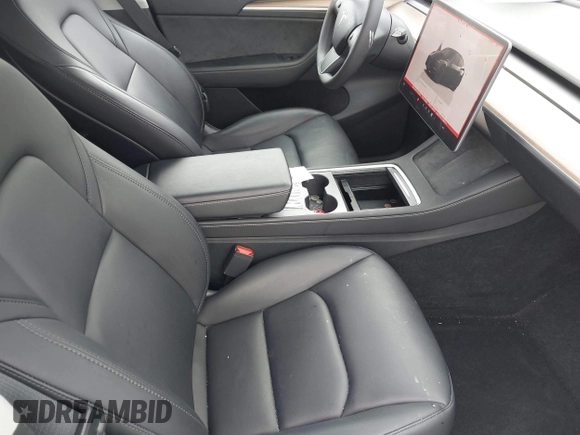 2023 Tesla Model Y Performance z VIN 7SAYGDEF7PF663387, wystawiony jako IAAI lot #42129258 z przebiegiem 42 691 mil mil oraz . Historia ofert i sprzedaży dostępna na DreamBid. Obrazek 5.