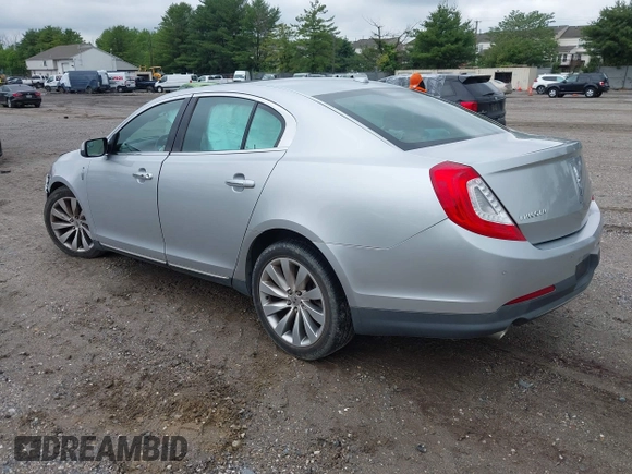 2013 Lincoln MKS with VIN 1LNHL9DK4DG606551, listed as a IAAI auction lot 42343140 with 70,424 mi miles and . Bid and sale history available at DreamBid. Image 3.