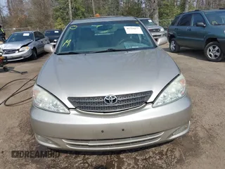 2004 Toyota Camry LE with VIN 4T1BF30K94U587836, listed as a IAAI auction lot 41714277 with 211,893 mi miles and . Bid and sale history available at carsss.com. Image 12.