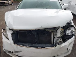 2005 Toyota Avalon XL z VIN 4T1BK36B65U032377, wystawiony jako IAAI lot #42100475 z przebiegiem Nie podano mil oraz . Historia ofert i sprzedaży dostępna na DreamBid. Obrazek 6.