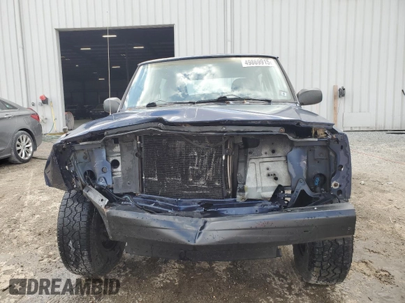 1997 Jeep Cherokee SE with VIN 1J4FT27P0VL612859, listed as a Copart auction lot 49869915 with 198,702 mi miles and Salvage title. Bid and sale history available at DreamBid. Image 5.