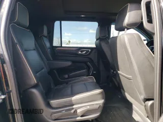 2023 Chevrolet Suburban Premier with VIN 1GNSKFKD8PR205665, listed as a Copart auction lot 51694655 with 27,882 mi miles and Salvage title. Bid and sale history available at DreamBid. Image 11.
