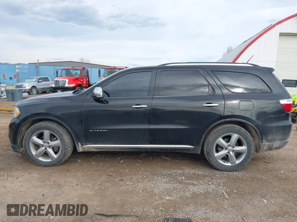 2011 Dodge Durango Citadel with VIN 1D4SE5GT0BC648692, listed as a IAAI auction lot 41892955 with 197,798 mi miles and . Bid and sale history available at DreamBid. Image 15.