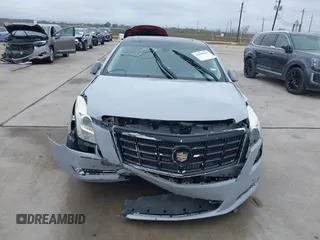 2013 Cadillac XTS Luxury with VIN 2G61P5S38D9213426, listed as a IAAI auction lot 41098261 with Not Provided miles. Bid and sale history available at carsss.com. Image 11.