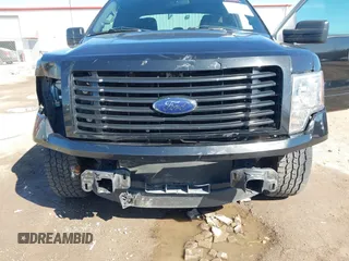 2014 Ford F-150 XL with VIN 1FTFX1CF5EKE00160, listed as a IAAI auction lot 41762642 with 145,402 mi miles. Bid and sale history available at carsss.com. Image 6.