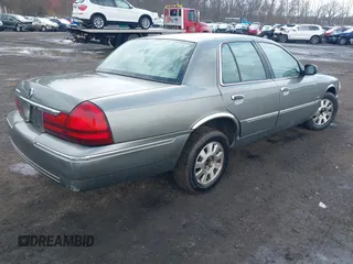 2003 Mercury Grand Marquis LS Premium with VIN 2MEFM75WX3X634344, listed as a IAAI auction lot 41888397 with 129,651 mi miles and . Bid and sale history available at DreamBid. Image 4.
