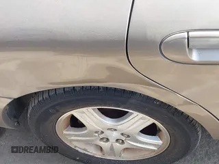 2002 Ford Taurus z VIN 1FAHP59U52G115825, wystawiony jako IAAI lot #41904552 z przebiegiem 91 004 mil mil oraz . Historia ofert i sprzedaży dostępna na DreamBid. Obrazek 12.