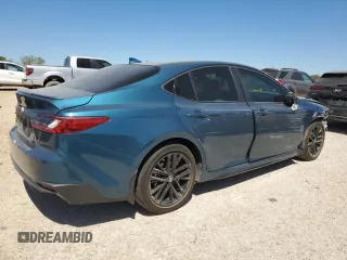 2025 Toyota Camry LE with VIN 4T1DAACKXSU060098, listed as a Copart auction lot 49723885 with 6,934 mi miles and Salvage Title. Bid and sale history available at carsss.com. Image 3.