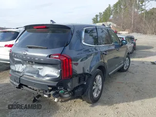 2021 Kia Telluride LX z VIN 5XYP24HCXMG189318, wystawiony jako IAAI lot #41458599 z przebiegiem 102 304 mil mil oraz . Historia ofert i sprzedaży dostępna na DreamBid. Obrazek 4.