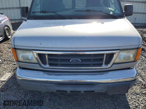 2005 Ford Econoline Passenger XL with VIN 1FBNE31LX5HA76002, listed as a Copart auction lot 43599865 with 198,749 mi miles and Salvage Title. Bid and sale history available at carsss.com. Image 12.