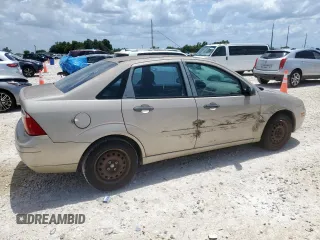 2006 Ford Focus S with VIN 1FAFP34N26W225772, listed as a Copart auction lot 62657045 with 117,078 mi miles and Salvage title. Bid and sale history available at DreamBid. Image 3.