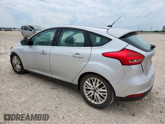 2017 Ford Focus Titanium with VIN 1FADP3N28HL346418, listed as a Copart auction lot 63507125 with 107,761 mi miles and Salvage title. Bid and sale history available at DreamBid. Image 2.
