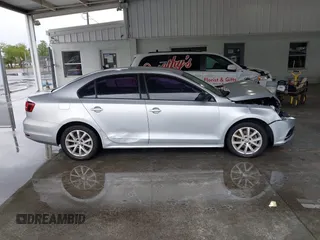 2016 Volkswagen Jetta Sedan 1.4T SE with VIN 3VWD67AJ2GM252658, listed as a IAAI auction lot 41757319 with 147,483 mi miles. Bid and sale history available at carsss.com. Image 13.