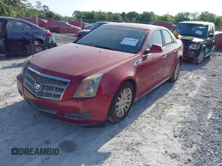2011 Cadillac CTS Luxury with VIN 1G6DG5EYXB0109144, listed as a IAAI auction lot 42161189 with 129,483 mi miles and . Bid and sale history available at DreamBid. Image 2.