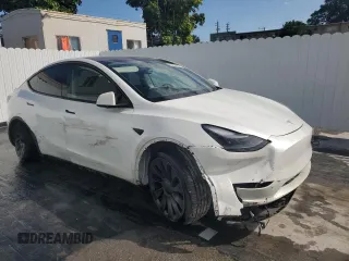 2023 Tesla Model Y Performance with VIN 7SAYGDEF8PF595178, listed as a Copart auction lot 46496995 with 39,057 mi miles and Non Repairable. Bid and sale history available at DreamBid. Image 4.