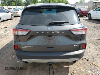 2020 Ford Escape Titanium с VIN 1FMCU9J99LUC63261, выставлен на аукционе Copart как лот 56312955 с пробегом Не указан миль и Списание • Salvage title. История ставок и продаж доступна на DreamBid. Изображение 6.