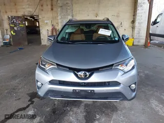 2018 Toyota RAV4 Limited with VIN 2T3DFREV4JW709049, listed as a IAAI auction lot 41596609 with 50,860 mi miles. Bid and sale history available at carsss.com. Image 12.