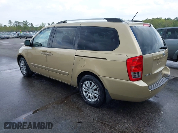 2011 Kia Sedona LX with VIN KNDMG4C71B6407306, listed as a IAAI auction lot 41922697 with 243,248 mi miles. Bid and sale history available at carsss.com. Image 3.