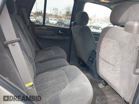 2004 GMC Envoy SLE with VIN 1GKDT13S142219365, listed as a IAAI auction lot 41612594 with 72,292 mi miles. Bid and sale history available at carsss.com. Image 8.