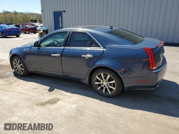 2009 Cadillac CTS AWD with VIN 1G6DH577390123365, listed as a Copart auction lot 54815885 with 141,026 mi miles and Salvage Title. Bid and sale history available at DreamBid. Image 2.