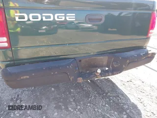1999 Dodge Dakota SLT z VIN 1B7GL22X0XS128071, wystawiony jako IAAI lot #42010239 z przebiegiem 150 495 mil mil oraz . Historia ofert i sprzedaży dostępna na DreamBid. Obrazek 6.