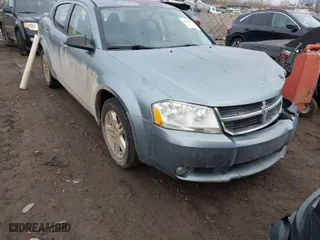 2009 Dodge Avenger SXT with VIN 1B3LC56B09N522736, listed as a IAAI auction lot 41195477 with 100,977 mi miles. Bid and sale history available at carsss.com. Image 1.