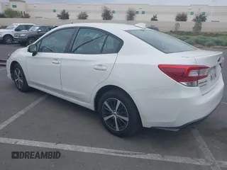 2021 Subaru Impreza Premium with VIN 4S3GKAV61M3604298, listed as a IAAI auction lot 42011198 with 50,667 mi miles and . Bid and sale history available at DreamBid. Image 3.